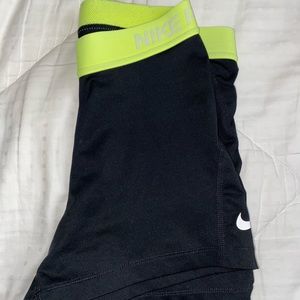 Black Nike Pro Spandex with Neon Yellow Waistband. Size Medium.